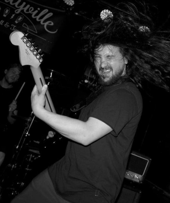 Brian in action on stage (black & white)
