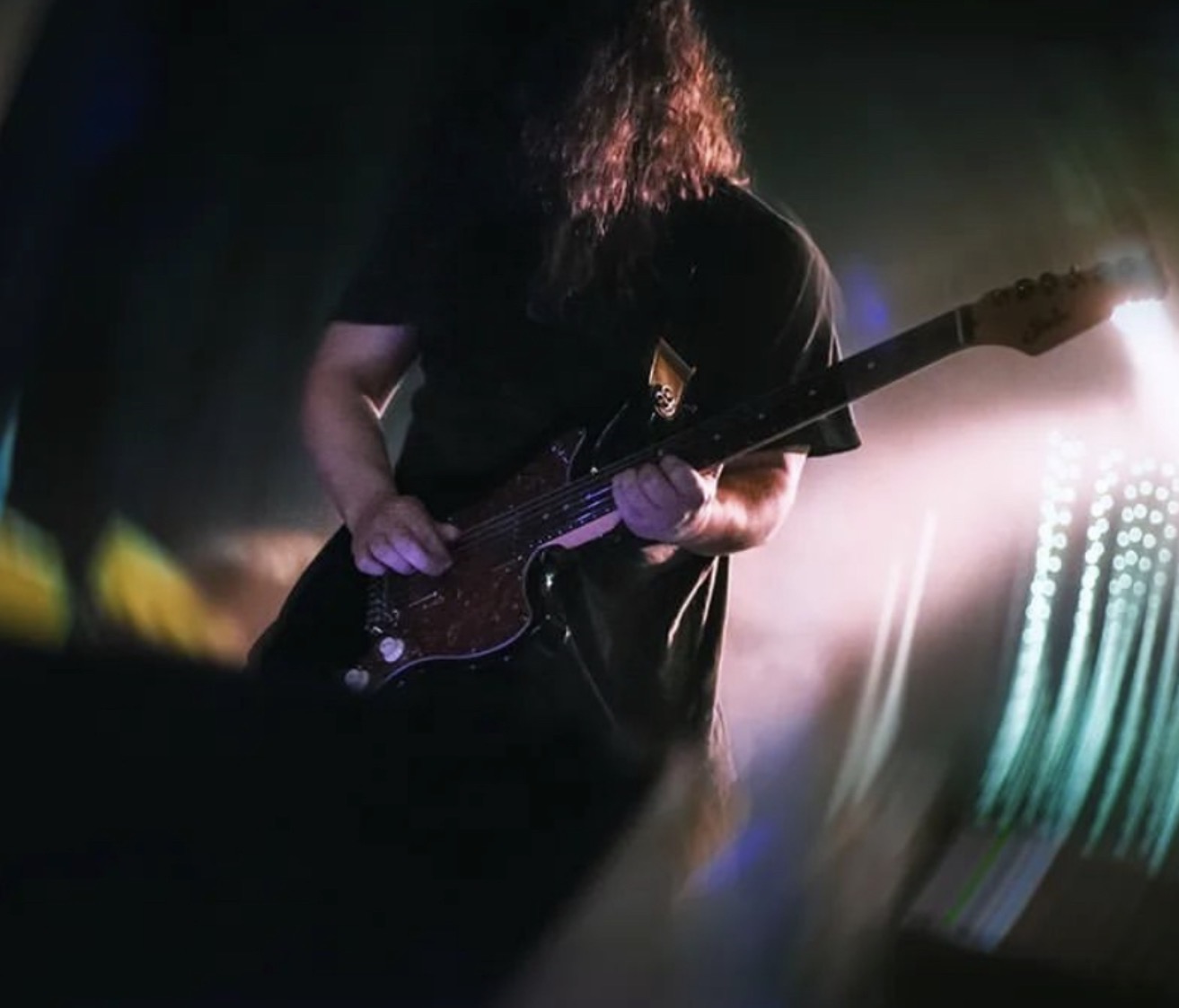 Brian (WhiplashCordsB) on stage with guitar